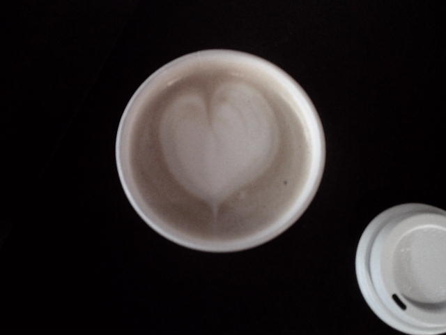 Coffee with a heart latte art on it.